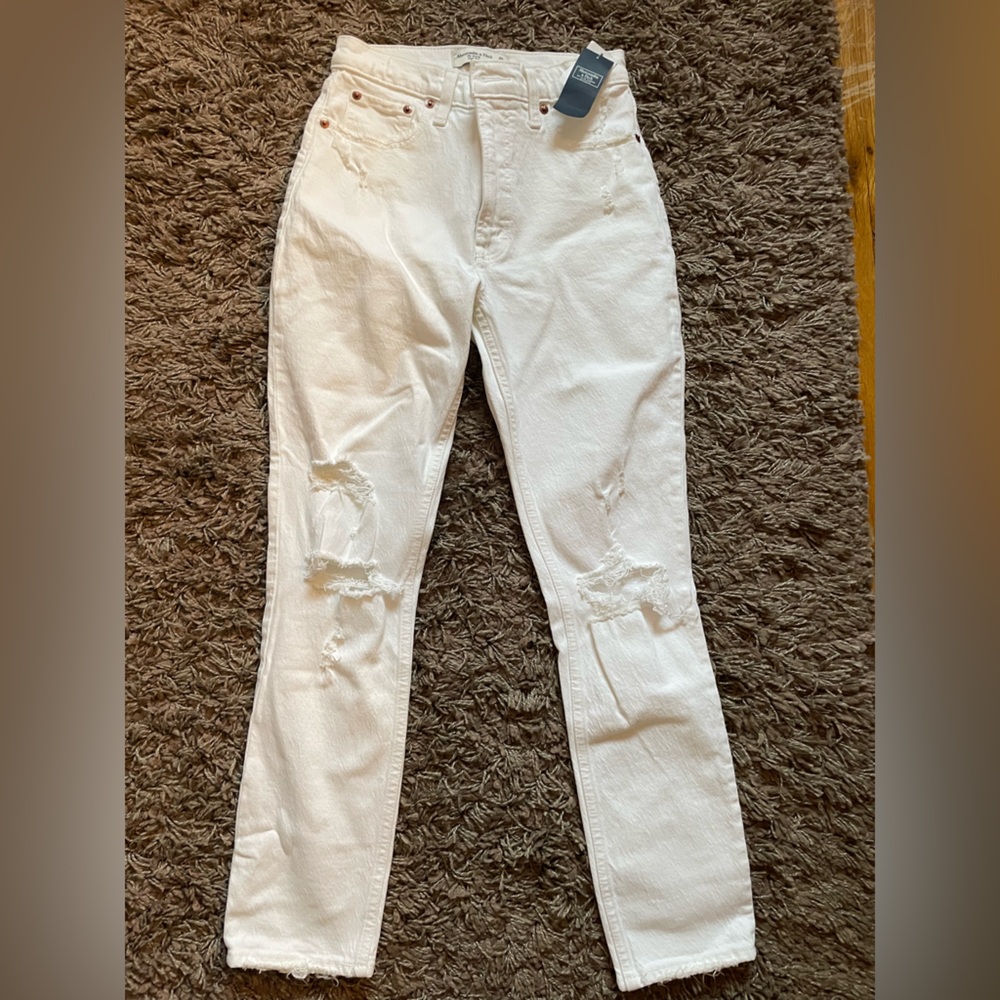 High waisted white jeans